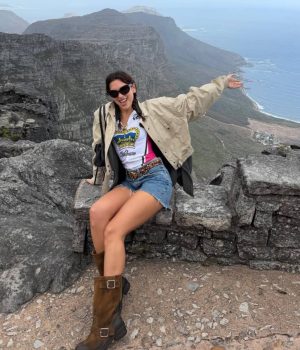 Global Pop Icon Dua Lipa Spotted on Luxury Cape Town Getaway Dua Lipa in Cape Town. Dua Lipa South Africa visit. celebrities in Cape Town 2026. Dua Lipa vacation photos. Table Mountain. Clifton beach South Africa.