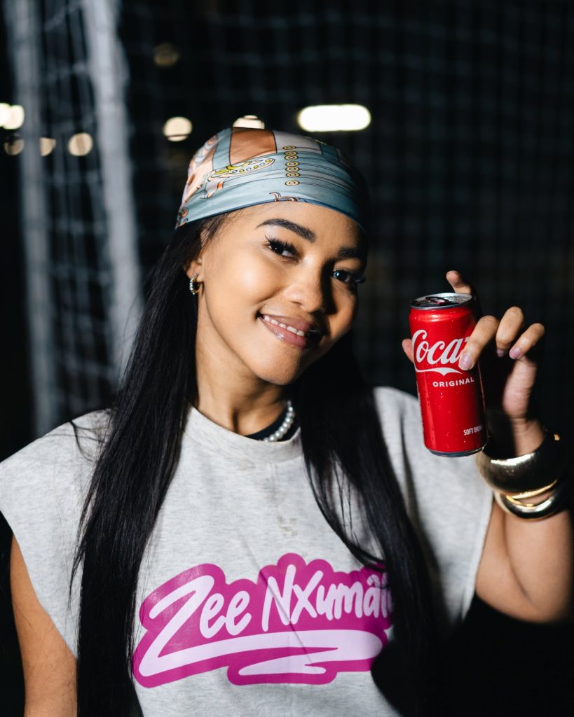 Zee Nxumalo Coca-Cola partnership. FIFA World Cup Trophy Tour South Africa 2026. Zee Nxumalo brand ambassador. Coca-Cola FIFA trophy tour tickets. Zee Nxumalo Funk 55. South African music news 2026.