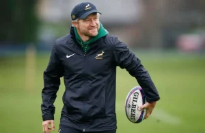 Is Springbok Attack Architect Tony Brown Heading Back to New Zealand? Rassie Erasmus. Tony Brown Springboks. Tony Brown All Blacks. Springbok Coaching Staff 2026. Rassie Erasmus Twitter. South Africa Rugby News. Rassie Erasmus uses a viral AI video to confirm that attack coach Tony Brown will not be joining the All Blacks. latest on the Springbok coaching lineup. Erasmus Shuts Down Tony Brown’s All Blacks Exit Rumors.