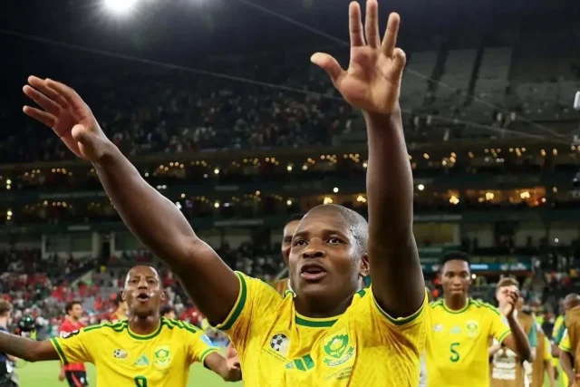 Discover Bafana Bafana's hypothetical knockout path to the FIFA World Cup trophy ahead of their Round of 32 clash with Canada. Plus, latest transfer updates on Mbekezeli Mbokazi and Rele Mofokeng. FIFA World Cup: Bafana Bafana's Potential Path to the Final & Transfer News. Bafana Bafana World Cup, Mbekezeli Mbokazi transfer, South Africa vs Canada kickoff, Relebohile Mofokeng Bundesliga, Round of 32 FIFA World Cup.