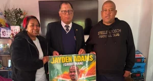 “A Huge Loss to South African Football” — Danny Jordaan Leads SAFA Delegation to Pay Respects to Jayden Adams’ Family Jayden Adams funeral arrangements Stellenbosch, Danny Jordaan visits Jayden Adams family, Bafana Bafana World Cup midfielder dies, Mamelodi Sundowns Jayden Adams tribute, Gayton McKenzie Jayden Adams cause of death. Danny Jordaan and SAFA Visit Grieving Family of Late Midfielder Jayden Adams