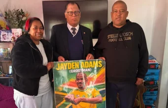 “A Huge Loss to South African Football” — Danny Jordaan Leads SAFA Delegation to Pay Respects to Jayden Adams’ Family Jayden Adams funeral arrangements Stellenbosch, Danny Jordaan visits Jayden Adams family, Bafana Bafana World Cup midfielder dies, Mamelodi Sundowns Jayden Adams tribute, Gayton McKenzie Jayden Adams cause of death. Danny Jordaan and SAFA Visit Grieving Family of Late Midfielder Jayden Adams