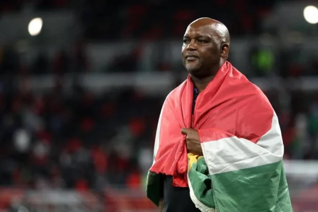 Pitso Mosimane Agrees Salary Deal to Return as Bafana Bafana Coach Pitso Mosimane Bafana Bafana coach. Pitso Mosimane Bafana Bafana return. Pitso Mosimane salary. Pitso Mosimane SAFA deal. Bafana Bafana new coach. Bafana Bafana coach 2026. SAFA Pitso Mosimane. Pitso Mosimane latest news. 2027 AFCON qualifiers. Hugo Broos replacement. South Africa national team coach.