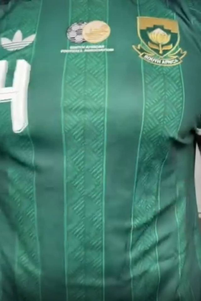 WWE Star Drew McIntyre Trains in New Bafana Bafana Kit (Video) Drew McIntyre workout video, Bafana Bafana green and gold jersey, 2026 FIFA World Cup kit. Drew McIntyre Bafana Bafana jersey, WWE Drew McIntyre South Africa, new Bafana Bafana adidas kit 2026