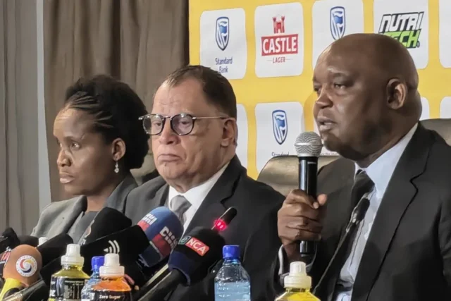 Pitso Mosimane Bafana Bafana. Pitso Mosimane latest. Danny Jordaan. Bafana Bafana coach. Pitso Mosimane return. Bafana Bafana AFCON qualifiers. South Africa vs Guinea. Bafana Bafana 2026. 2030 FIFA World Cup. SAFA. Hugo Broos. Bafana Bafana news. South African football